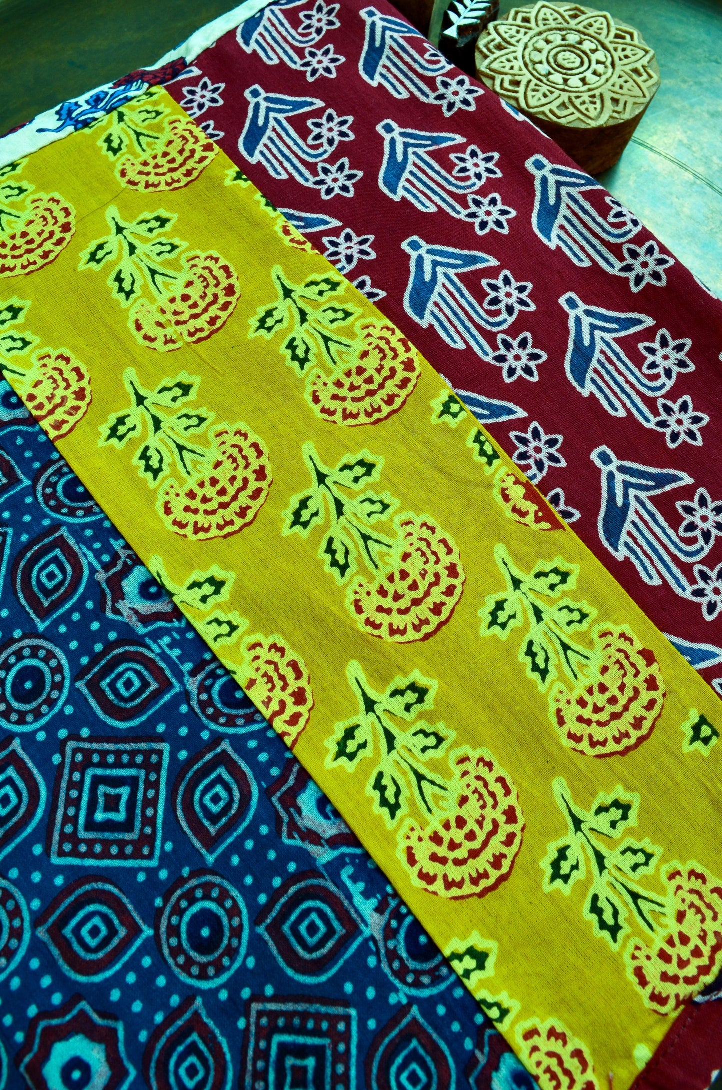 Ajrakh cotton patchwork dupatta featuring vibrant patterns in red, yellow, and blue colors