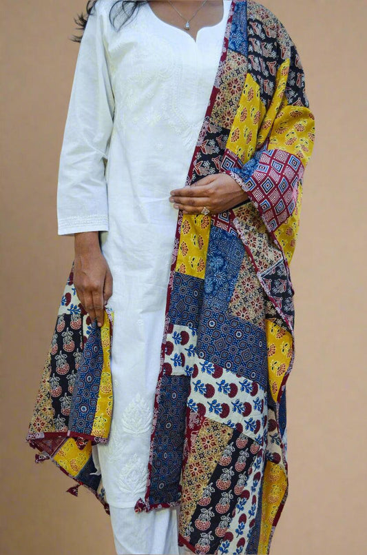 Ajrakh cotton patchwork dupatta featuring vibrant colors and intricate patterns, draped elegantly