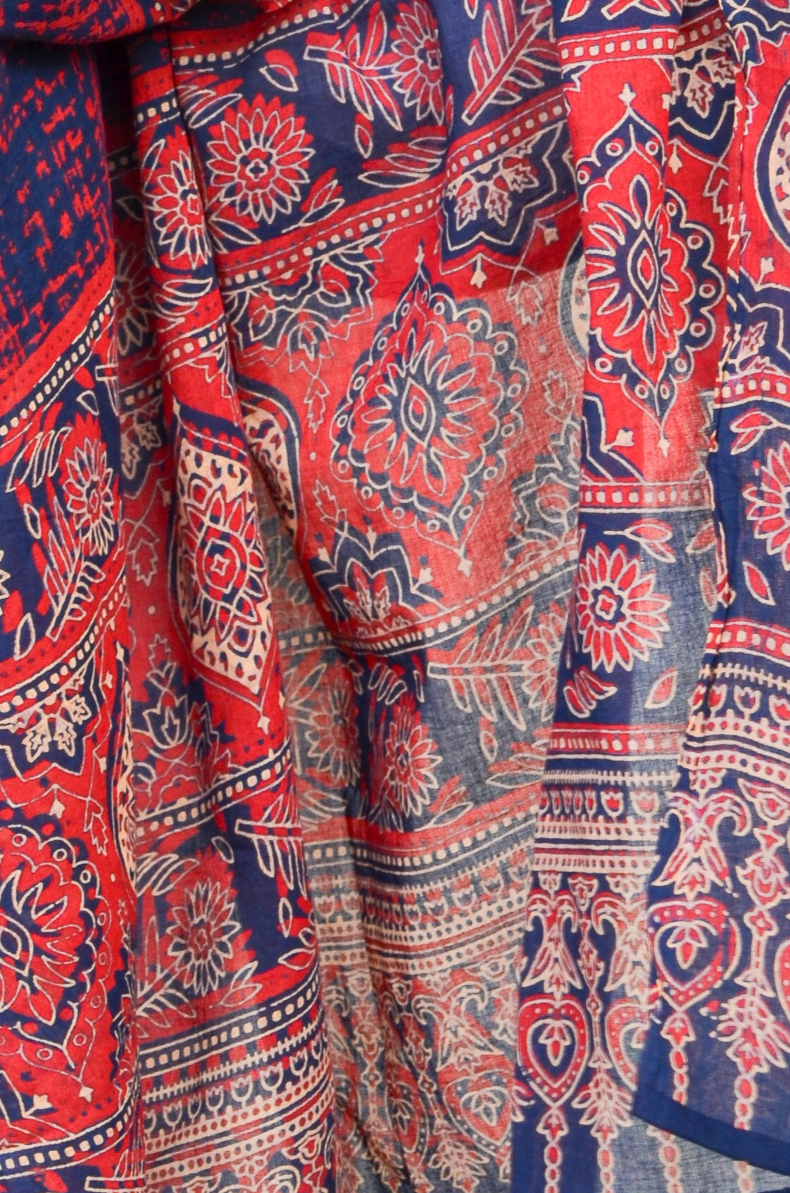 Ajrakh hand block printed dupatta with intricate red and blue floral patterns showcasing traditional craftsmanship