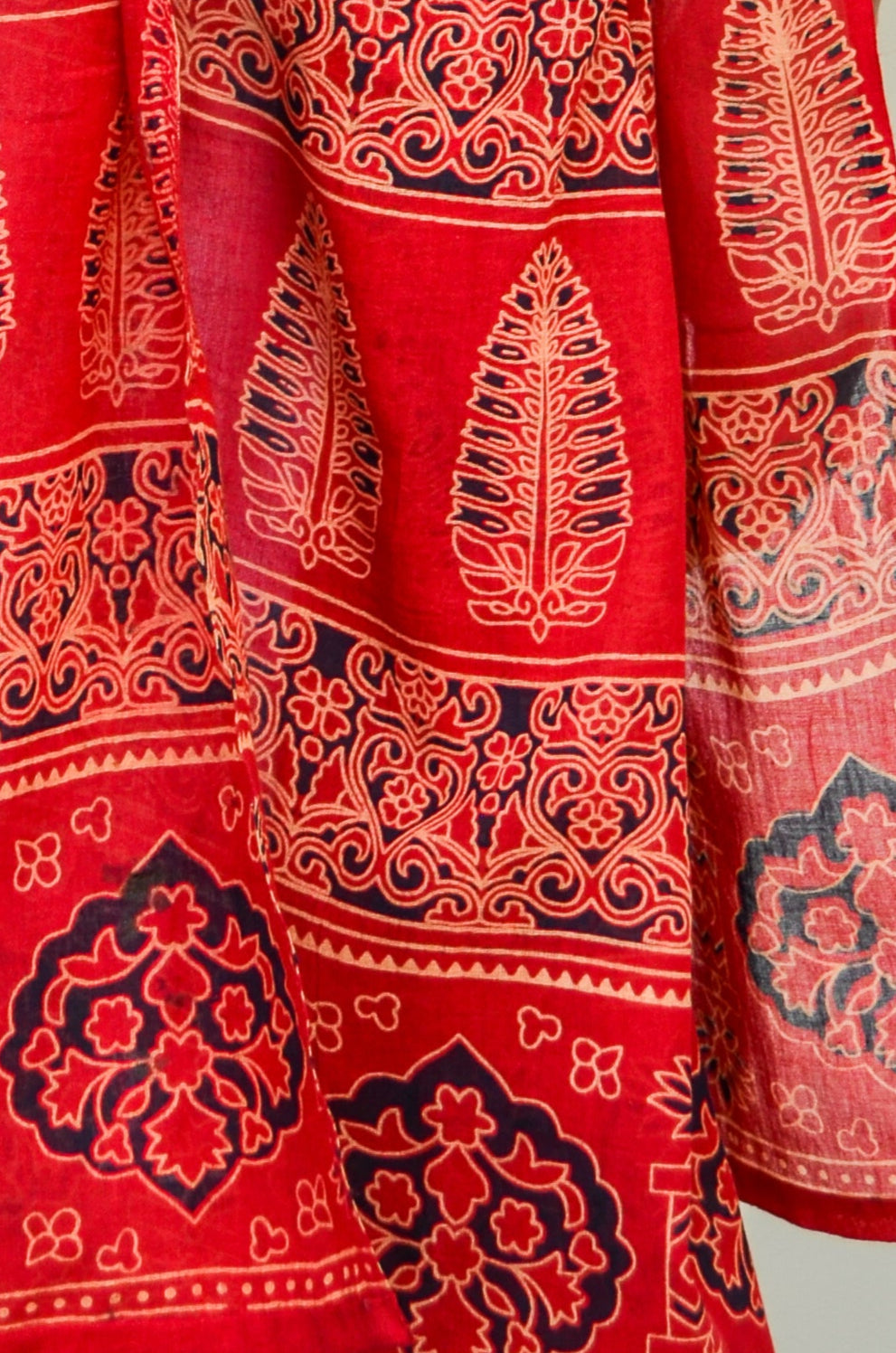 Pinaachi Ajrakh hand block printed dupatta in vibrant red with intricate designs and patterns