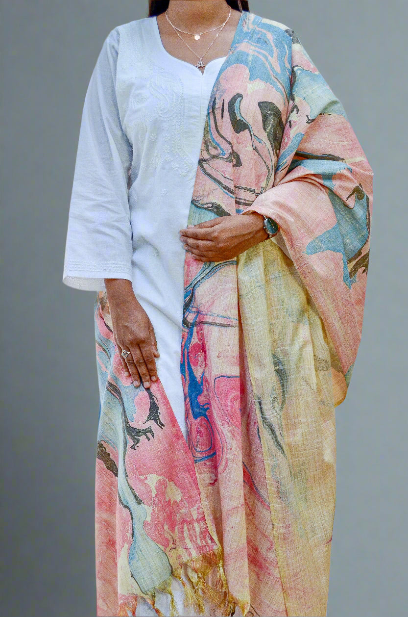 Stylish model wearing a handwoven cotton marble printed dupatta in pastel colors with intricate designs