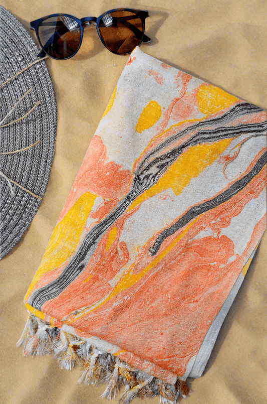 Handwoven cotton silk marble dupatta in vibrant orange and yellow hues with tassels and a textured finish