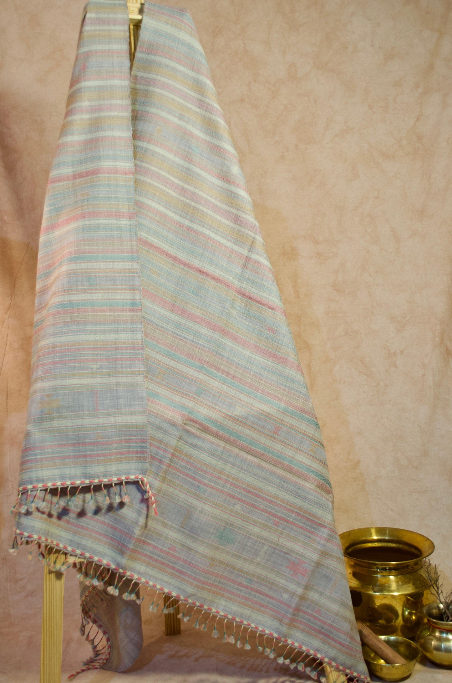 Kutchhi traditional shawl in pastel colors with intricate patterns and fringed edges