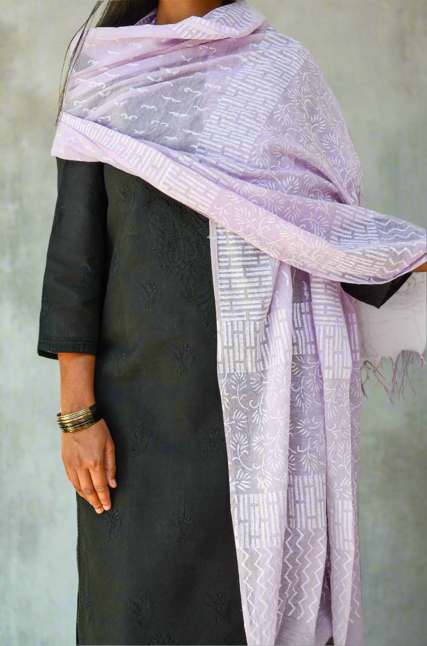 Elegant lilac chanderi silk dupatta styled over a black ethnic outfit for a sophisticated look