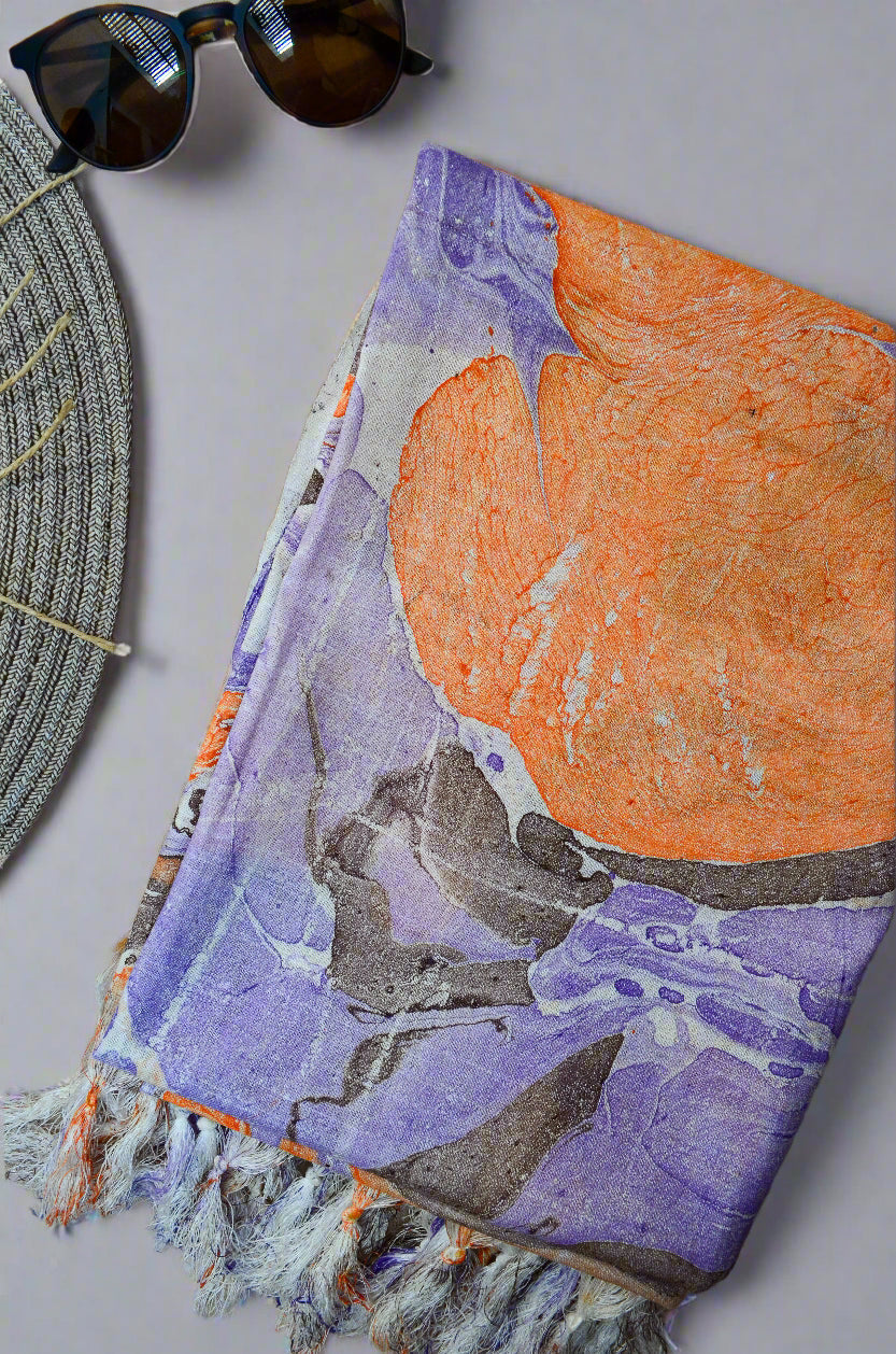 Marble printed cotton silk dupatta featuring vibrant orange and purple hues with tassels