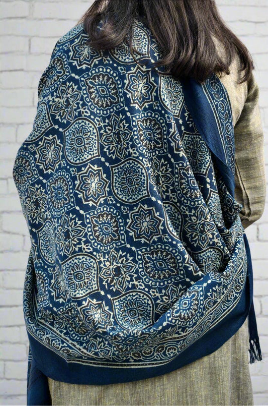 Elegant Merino wool Ajrakh shawl in blue with intricate floral patterns for stylish warmth