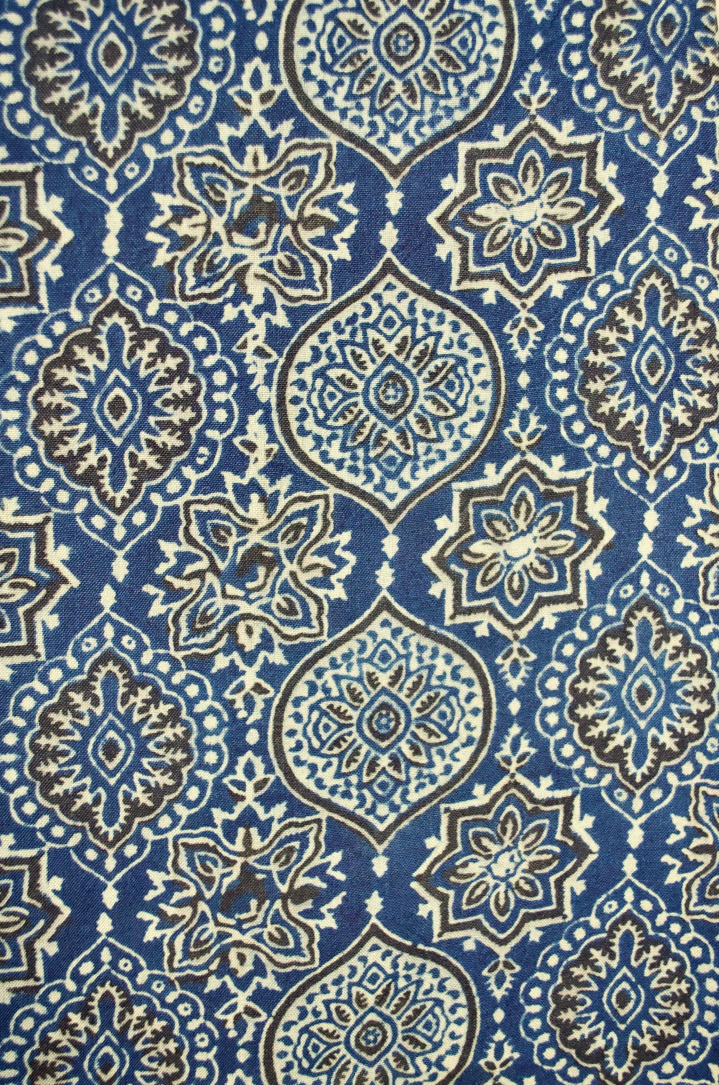 Beautiful Merino wool Ajrakh shawl featuring intricate blue and white patterns for stylish warmth