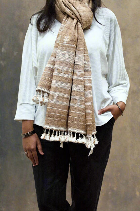 Elegant Merino wool and Tasar silk stole with delicate embroidery and tassels, worn casually