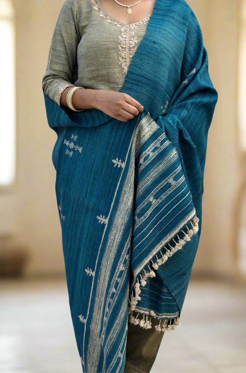 Elegant merino wool indigo shawl with intricate patterns, perfect for enhancing any outfit