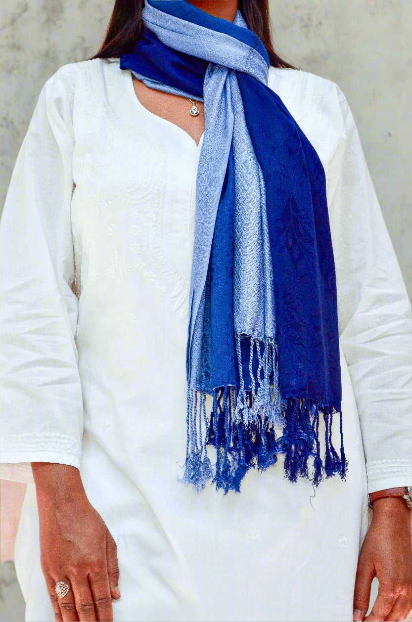 Elegant midnight blue jacquard stole displayed on a model, perfect for stylish layering