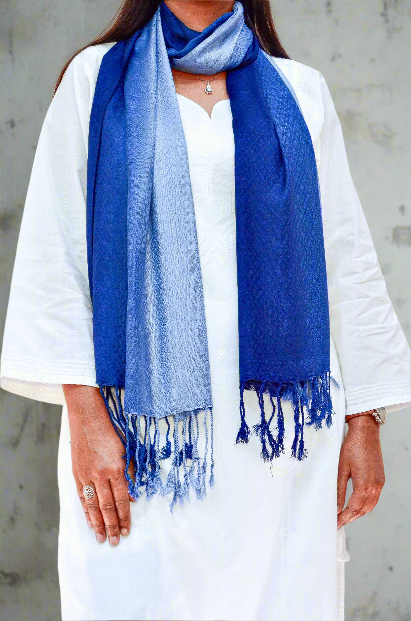 Elegant midnight blue jacquard stole featuring a textured design and fringed ends