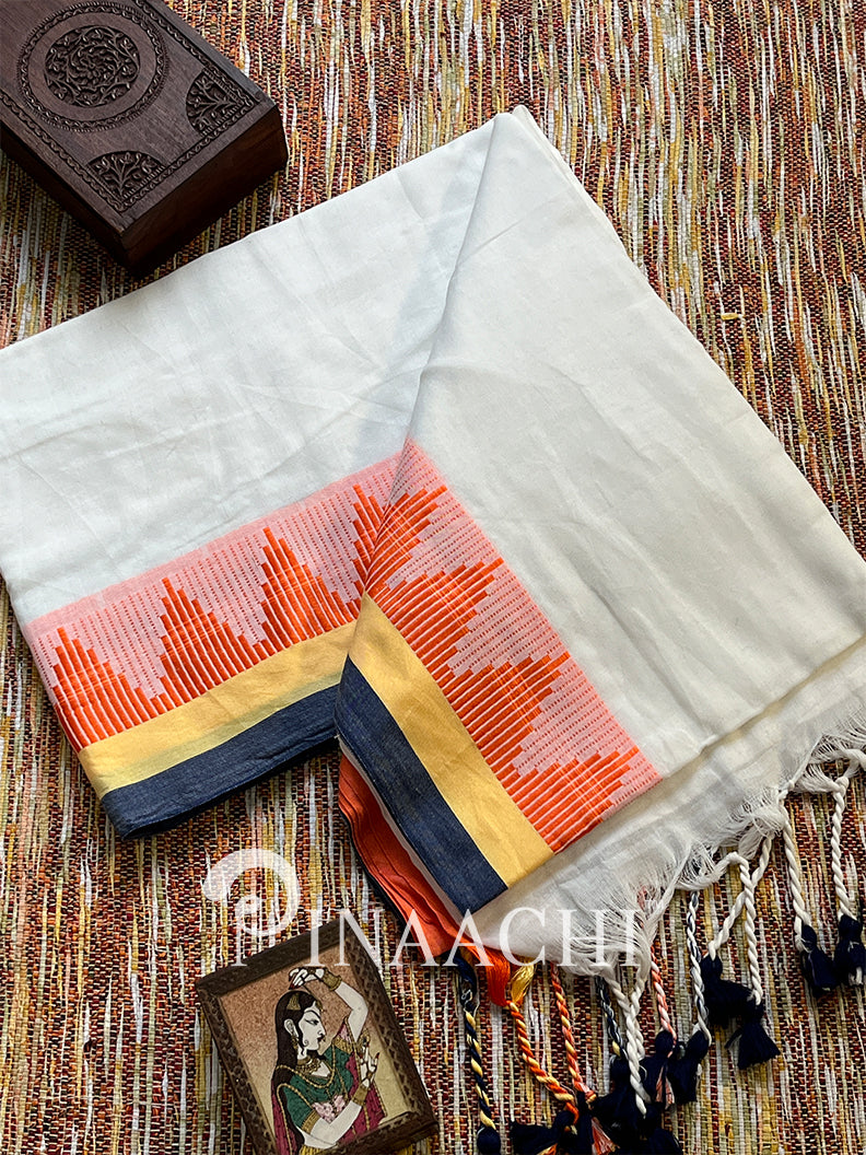Handspun white cotton saree with colorful geometric border and tassels for elegant style