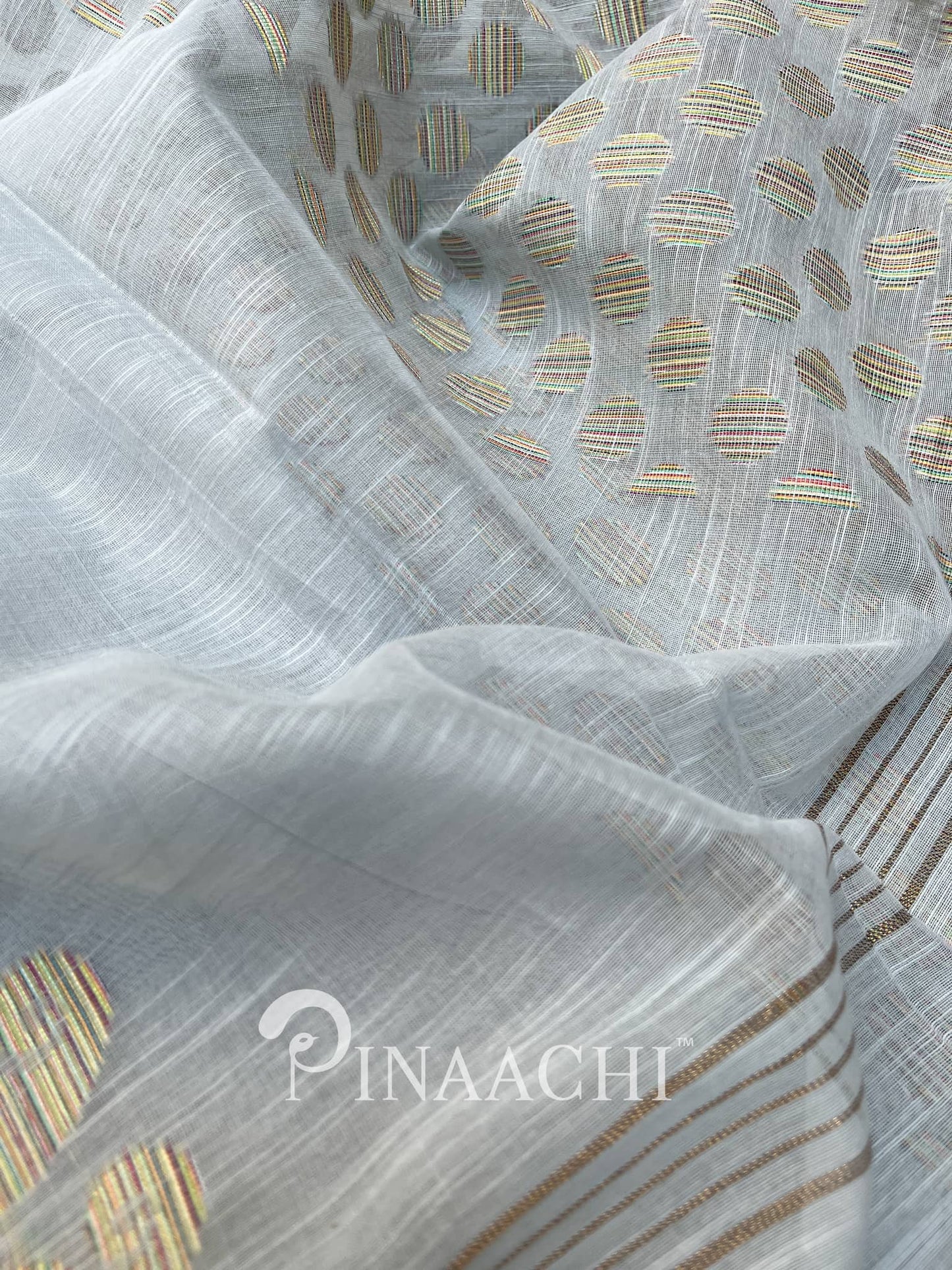 Pinaachi light blue handloom jamdani saree with intricate golden patterns and soft fabric