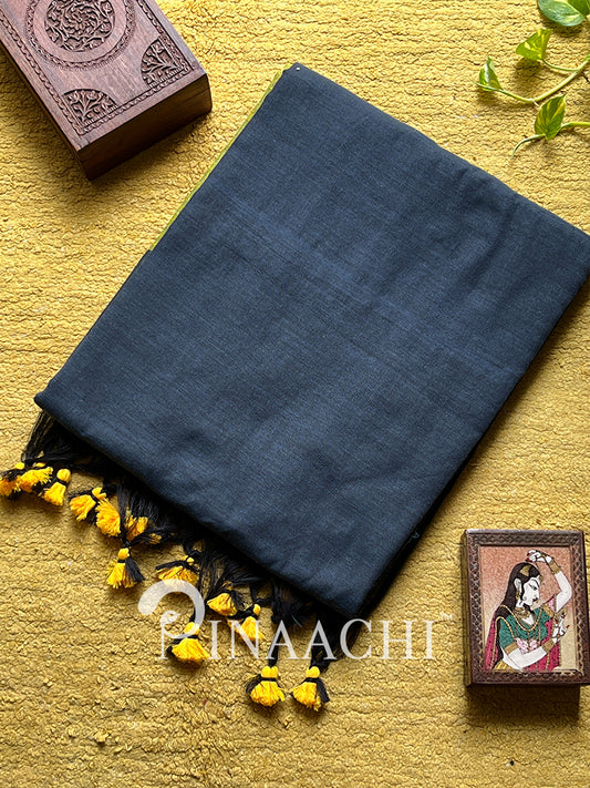 Elegant olive green handloom cotton saree with delicate tassel detailing for a stylish look