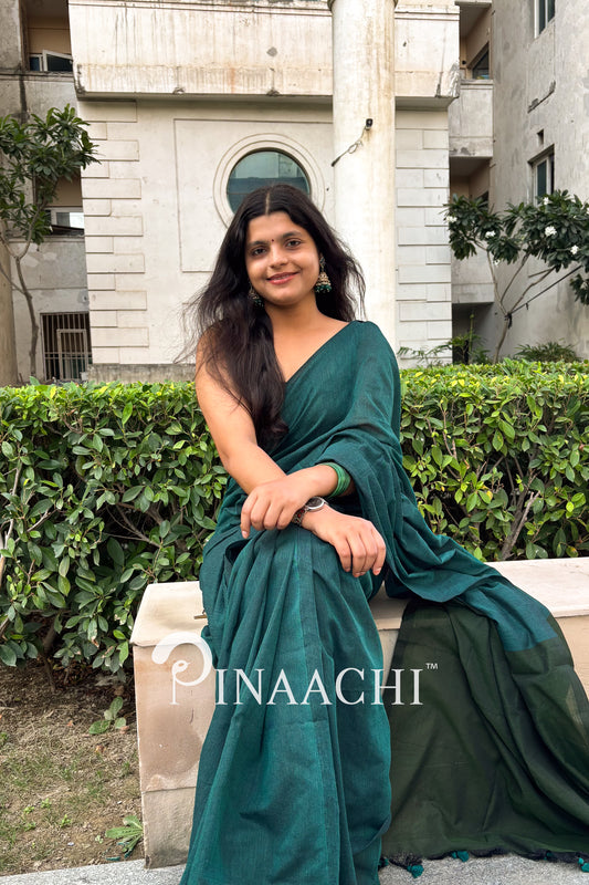 Elegant teal green cotton saree from Pinaachi, draped beautifully for a stunning look