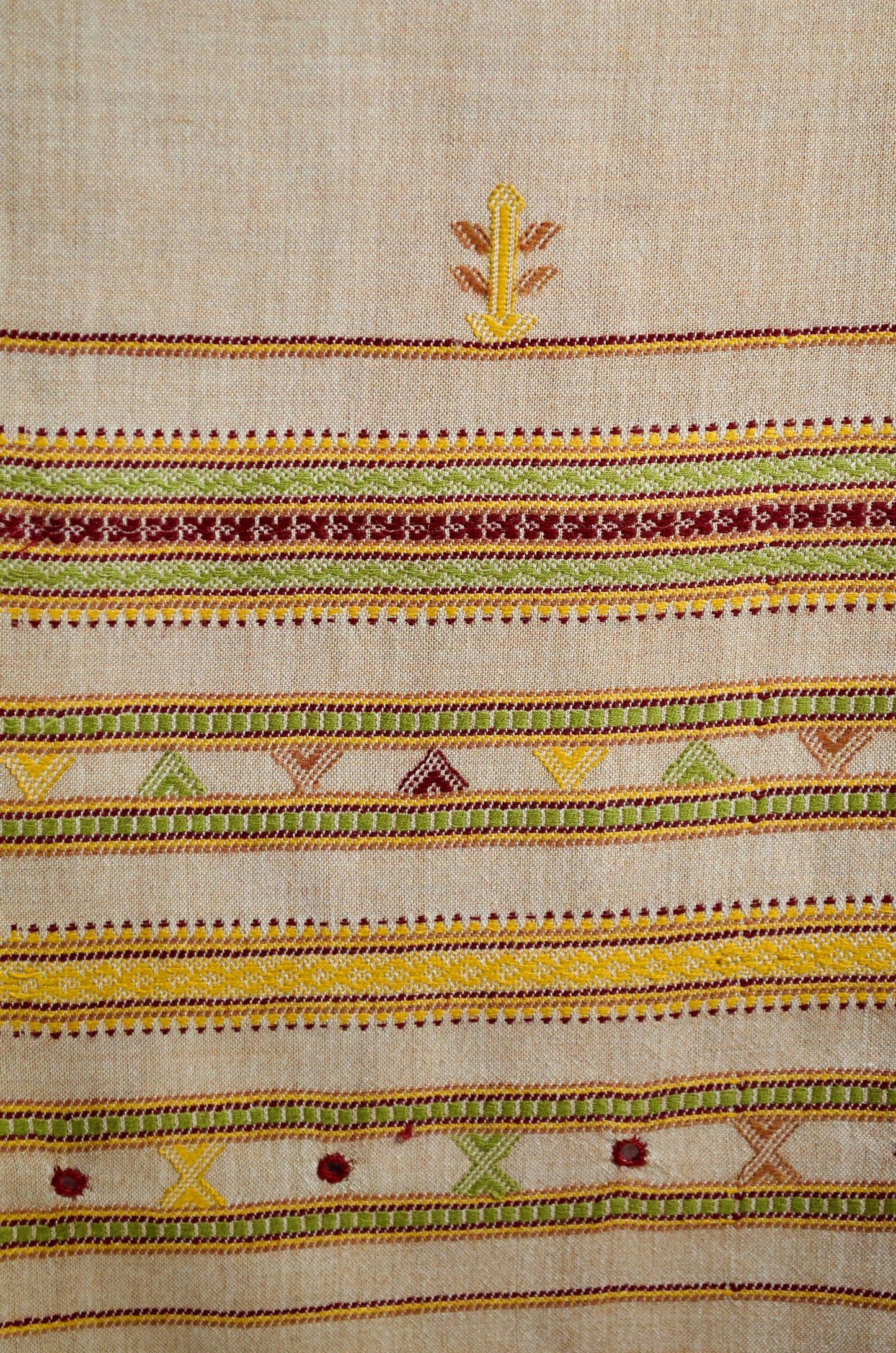 Elegant pure merino wool stole with vibrant hand-stitched patterns and rich colors