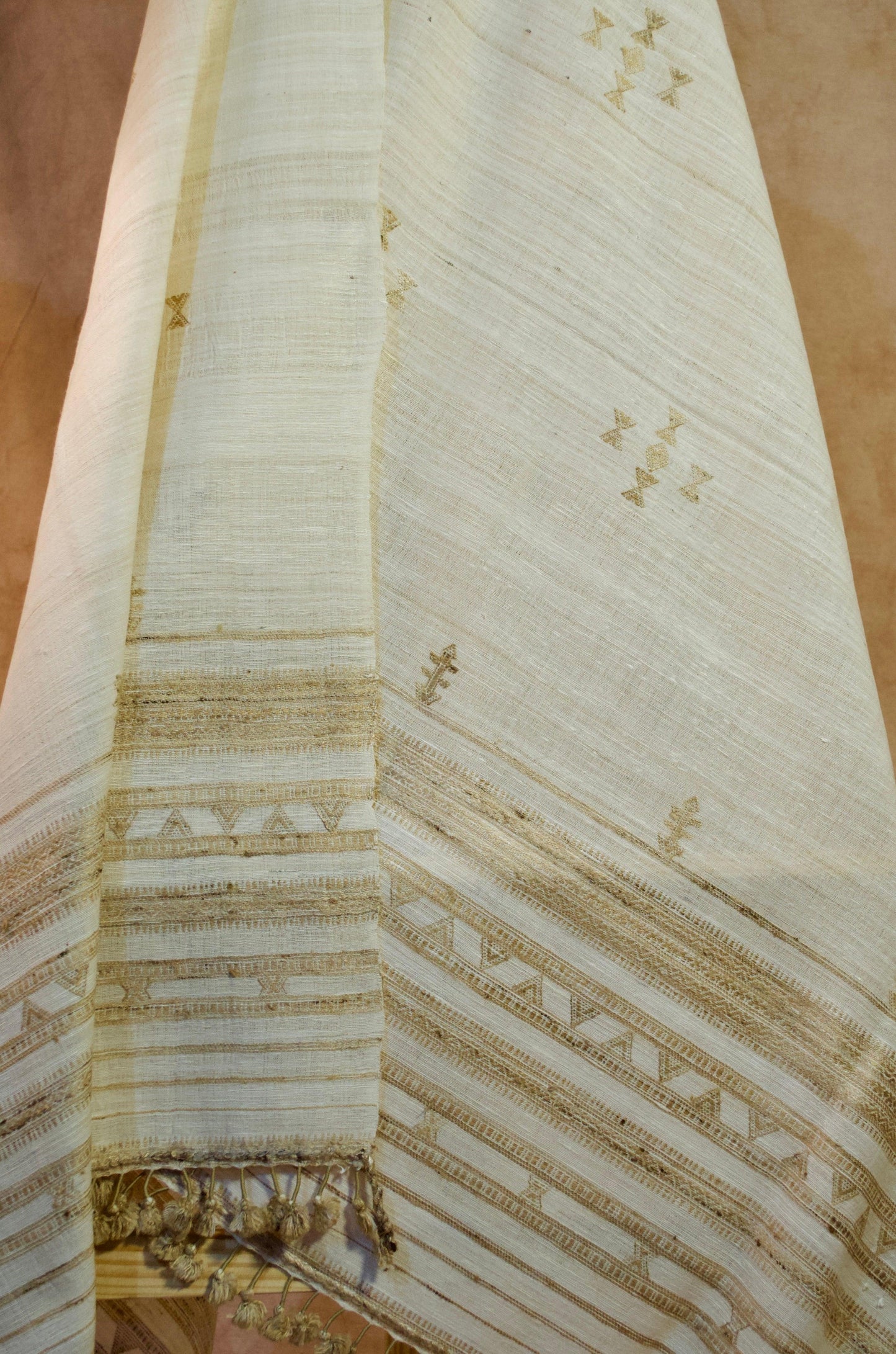 Elegant pure merino wool tasar silk shawl with intricate golden patterns and soft texture