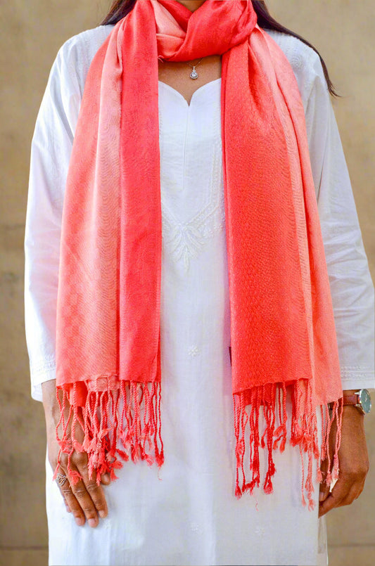 Stylish red gradient jacquard stole with fringed ends, perfect for adding elegance to any outfit