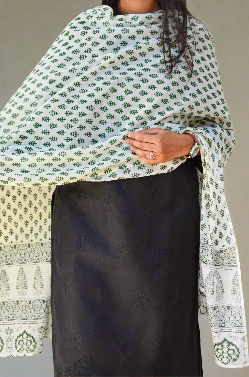 Sanganeri hand block printed dupatta in green floral design draped elegantly over a black outfit