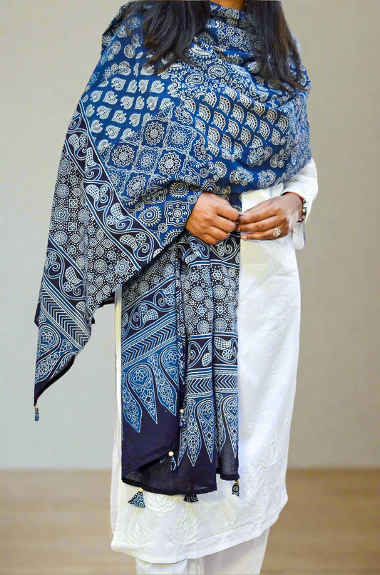Elegant Ajrak hand block printed dupatta in blue featuring intricate patterns and tassels