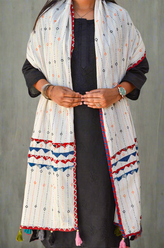 Pinaachi Ajrakh cotton stole with patchwork featuring colorful geometric designs and tassels