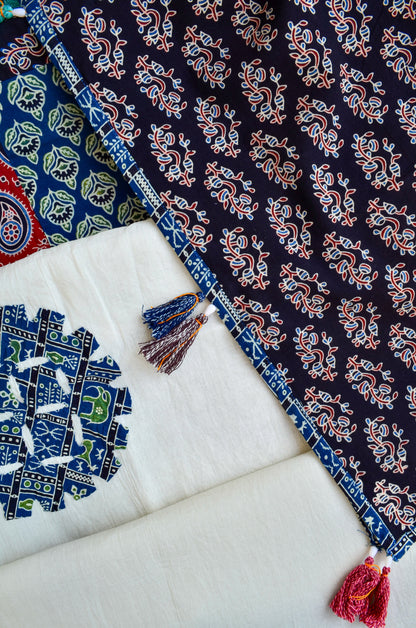 Ajrakh hand block printed dupatta with vibrant patterns and decorative tassels for elegant styling