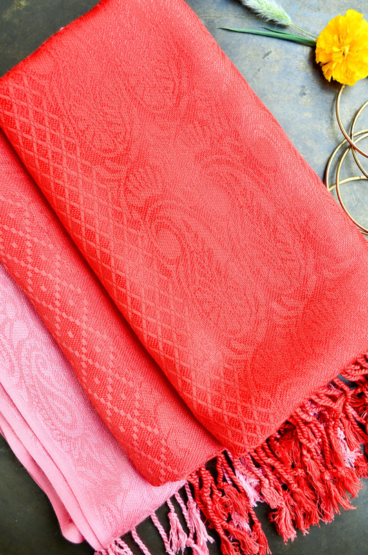 Crimson jacquard stole by Pinaachi featuring intricate texture and stylish fringes