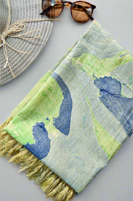 Handwoven cotton marble print dupatta in pastel colors with fringed edges, perfect for stylish outfits