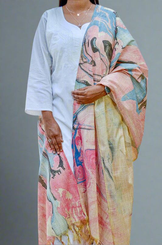 Stylish model wearing a handwoven cotton marble printed dupatta in pastel colors with intricate designs