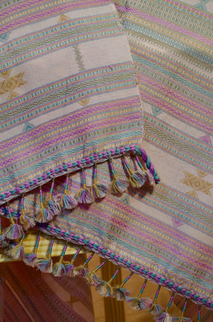 Elegant handwoven merino wool silk shawl with colorful patterns and decorative tassels