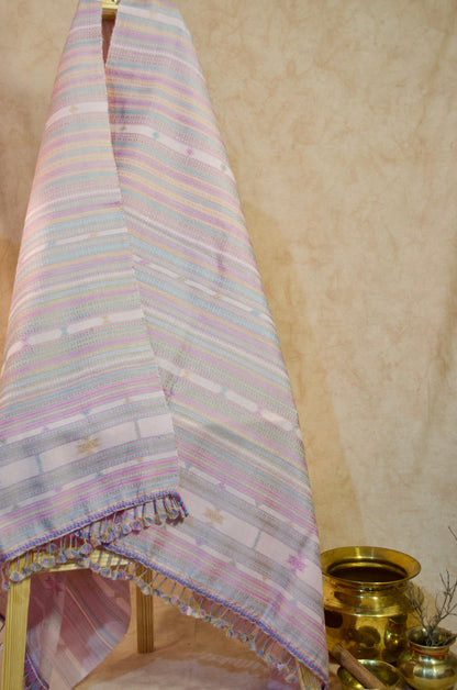 Handwoven merino wool silk shawl in pastel colors with a decorative weave pattern