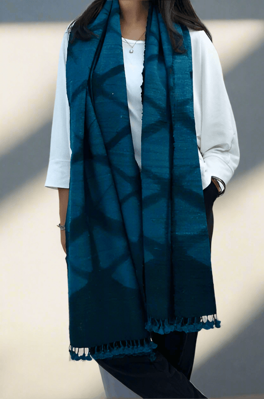 Elegant handwoven merino wool stole in deep teal, perfect for layering and versatile styling