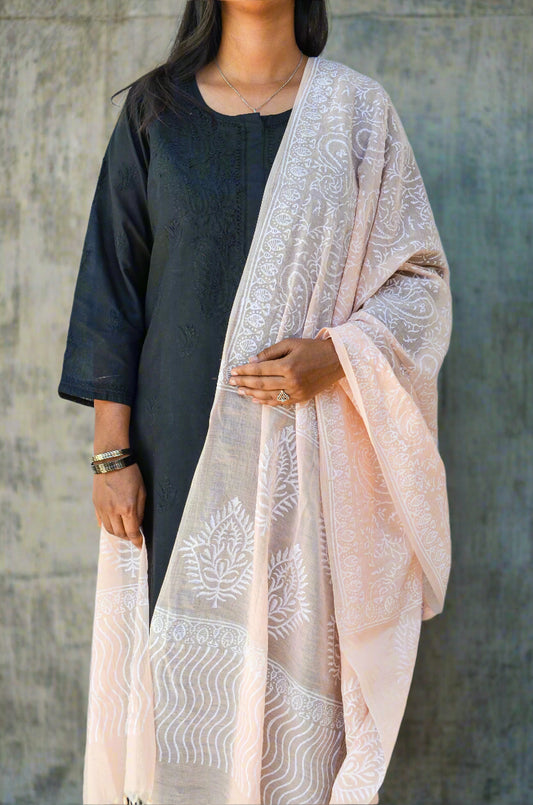 Elegant Khari print Chanderi silk dupatta in soft peach, styled with a black ethnic outfit