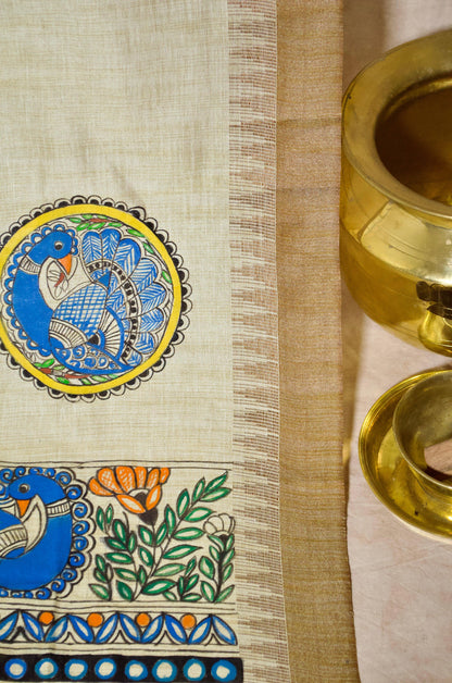 Madhubani hand painted dupatta with intricate designs and vibrant colors on a light background
