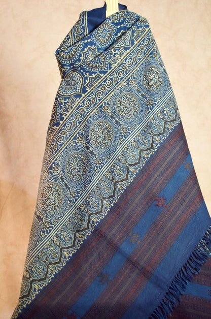 Stylish Merino wool Ajrakh shawl with intricate blue and maroon patterns, perfect for elegant layering