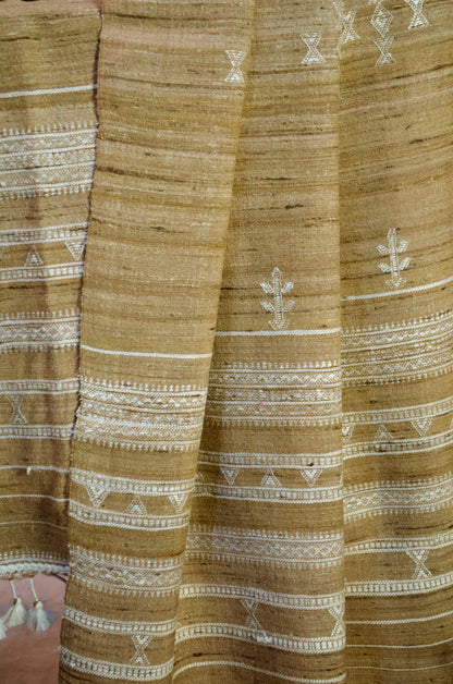 Elegant Merino wool and Tasar silk stole with intricate embroidery and tassels for stylish layering