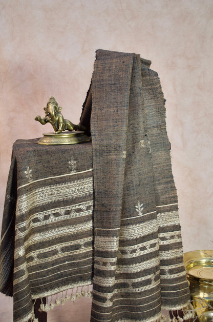 Elegant merino wool tasar silk stole with intricate silver patterns, perfect for stylish layering