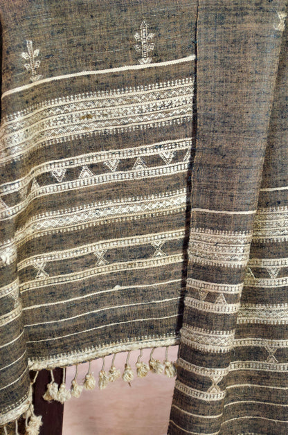 Elegant merino wool tasar silk stole with intricate patterns and tassels for stylish layering