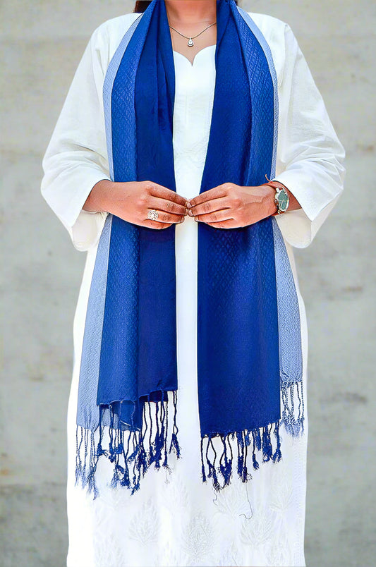Elegant midnight blue jacquard stole featuring fringed edges, perfect for adding style to any outfit