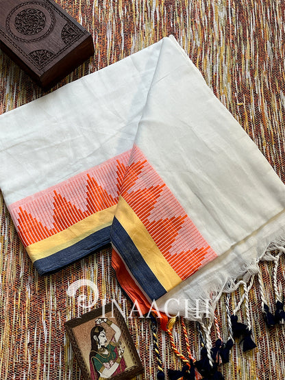 Handspun white cotton saree with colorful geometric border and tassels for elegant style