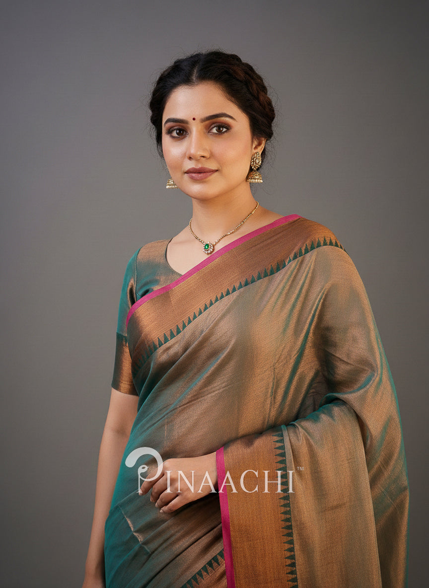 Elegant aqua copper tissue silk saree designed by Pinaachi with intricate detailing and style