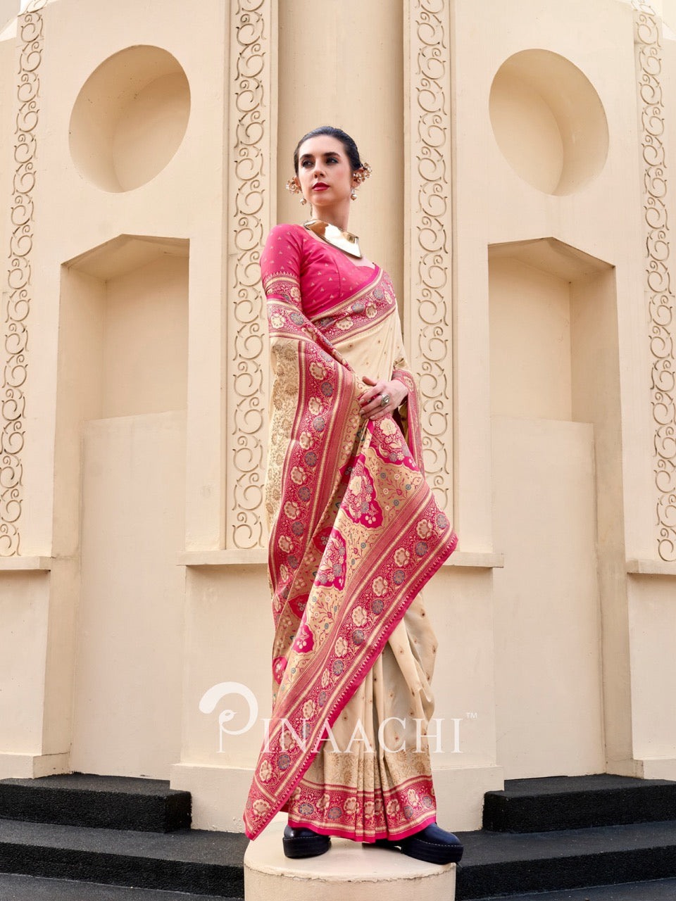Elegant Pinaachi Banarasi silk saree for wedding in cream and pink with intricate golden designs