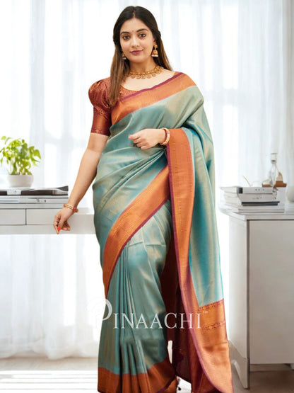 Elegant blue maroon licchi silk saree designed by Pinaachi for a sophisticated look