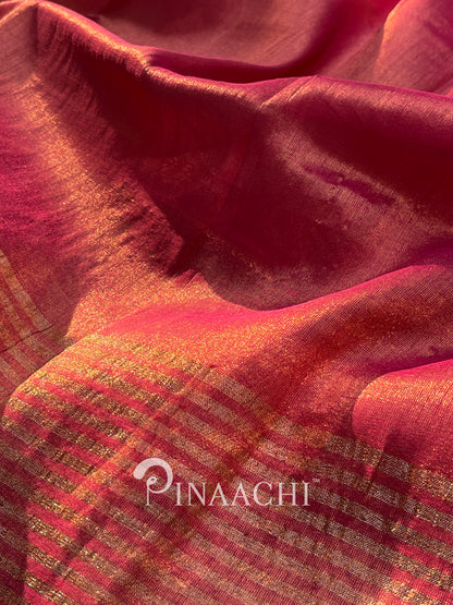 Elegant coral blush mul tissue saree by Pinaachi with a shimmering finish