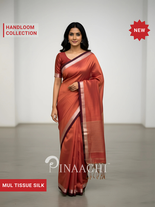 Pinaachi coral blush mul tissue saree with elegant drape and subtle sheen in silk fabric