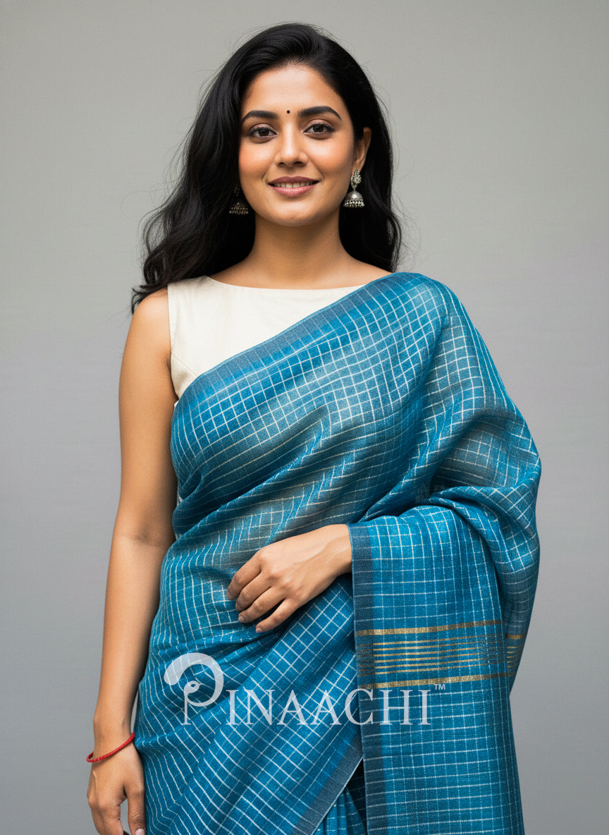 Pinaachi deep blue checked mulmul saree with a soft finish suitable for festive occasions