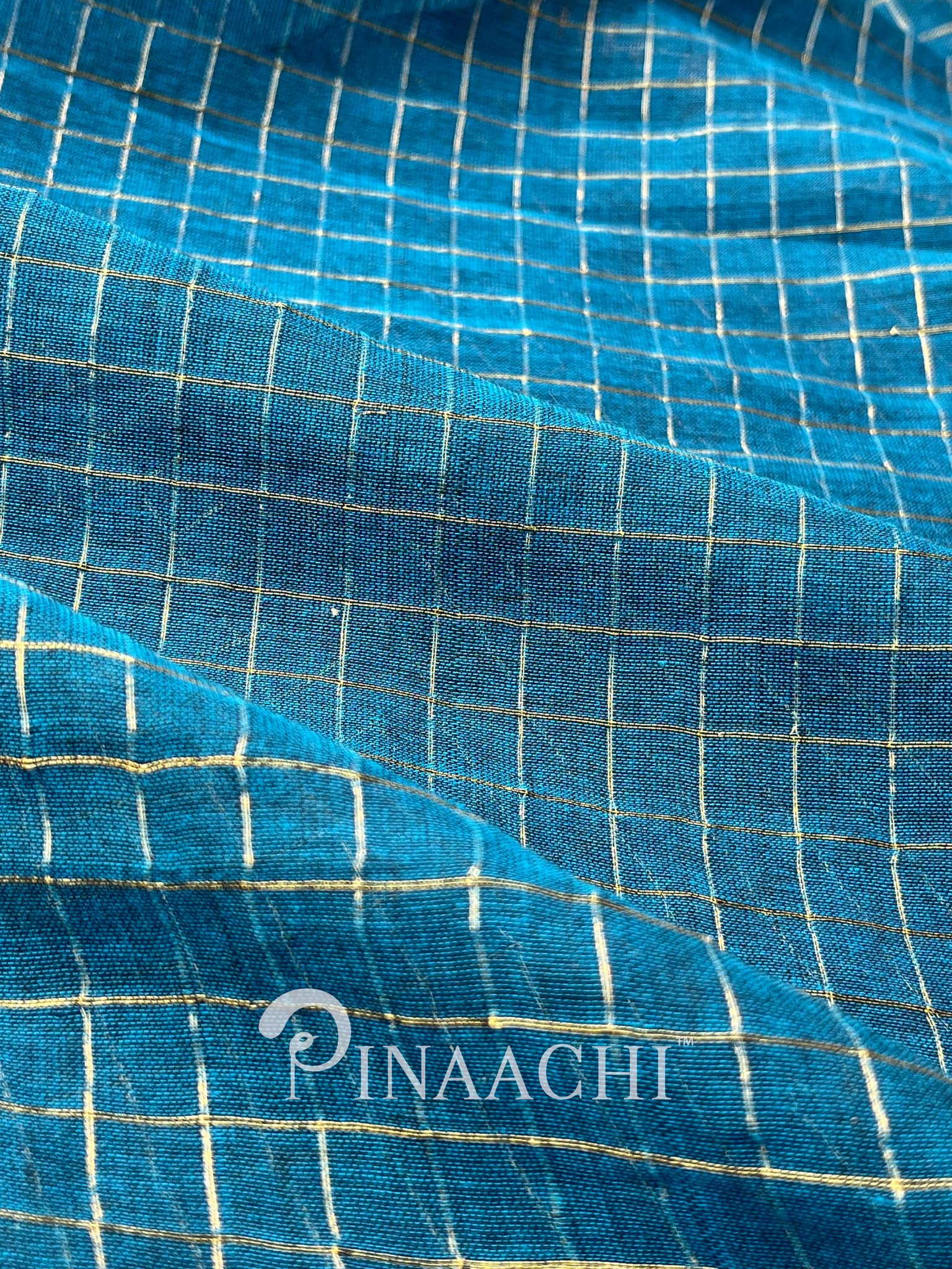 Pinaachi deep blue checked mulmul saree made of soft lightweight fabric for elegant draping