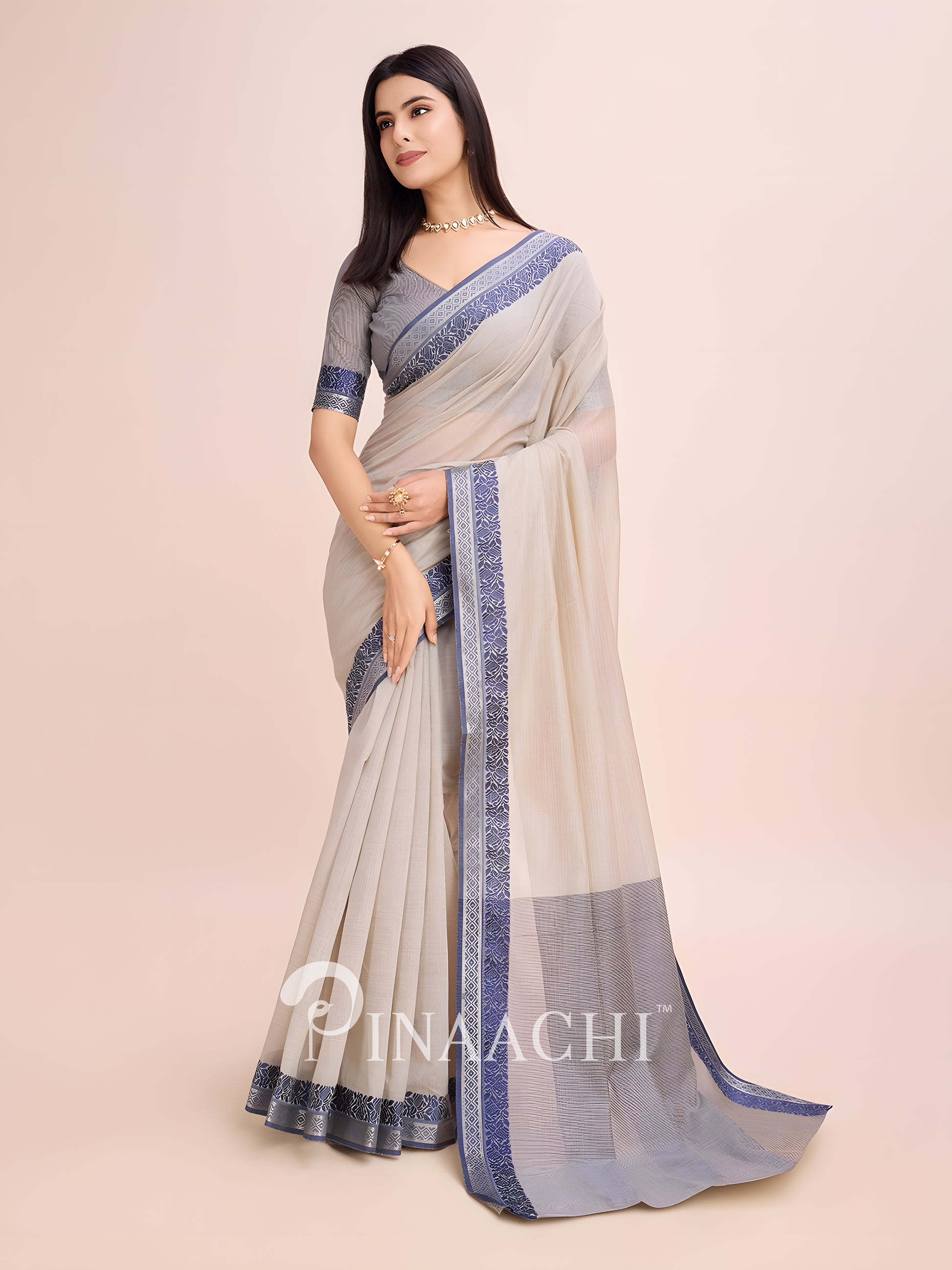Elegant dove grey cotton saree with a stylish border, perfect for formal occasions