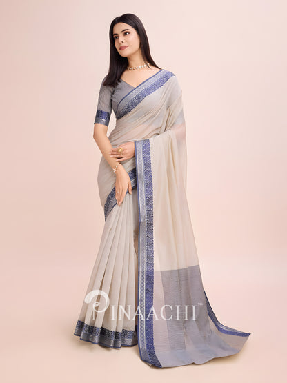 Elegant dove grey cotton saree with a stylish border, perfect for formal occasions