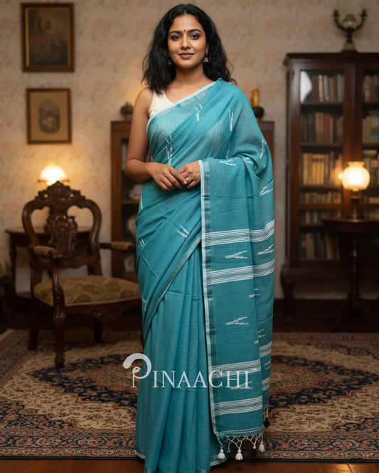Pinaachi rama green jamdani saree with intricate weaving and elegant drape